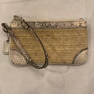 Used 100 percent Coach wristlet
